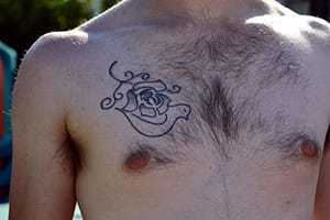 tattoo on man's chest 